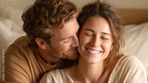 Intimate couple embracing at home joyful moment captured warm and cozy bedroom setting close-up view