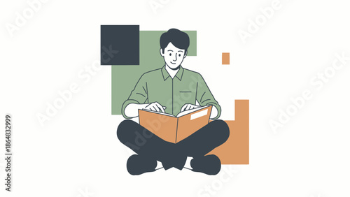 Young man reading a book while sitting cross-legged in a modern indoor setting with geometric