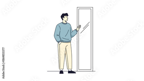 Young man using smartphone standing next to full-length mirror for reflection or dressing room check