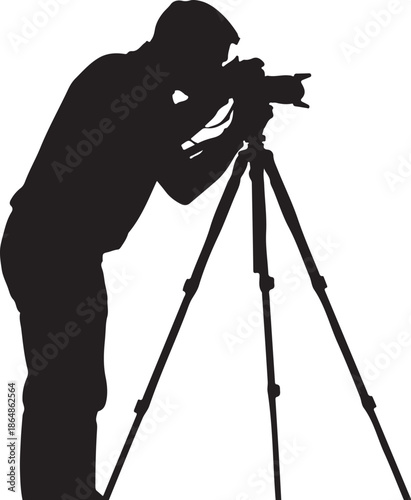 Photographer using camera on tripod capturing moments