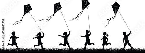 Black silhouette of a group of happy children running and flying kites in a grass field, joyful kids outdoor play,