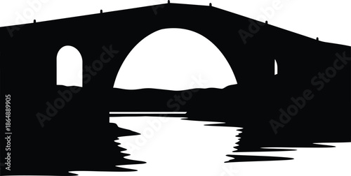 Historic stone arch bridge over the river at night showcasing old architecture and travel landmarks in a European park landscape under the dark sky