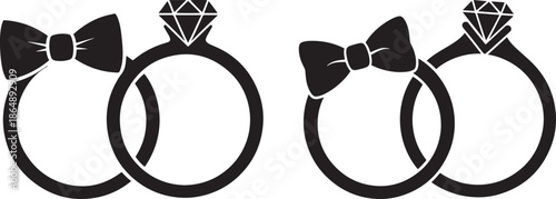 Interlocking Wedding Band Silhouettes with Bow and Diamond Accents