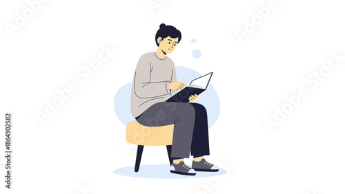 Young woman sitting comfortably on a stool and working on her laptop in a relaxed environment