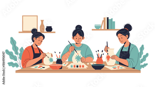 Three women enjoying a pottery painting workshop, sitting together at a table and decorating ceramic vases in a creative and collaborative art class.