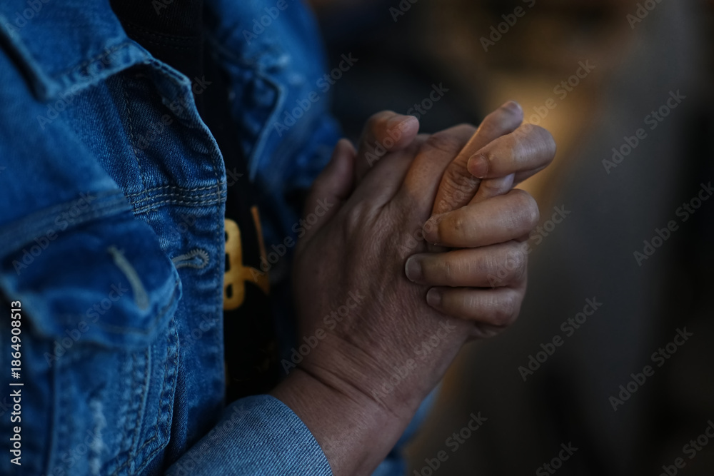Fototapeta premium Human hands praying at Church.