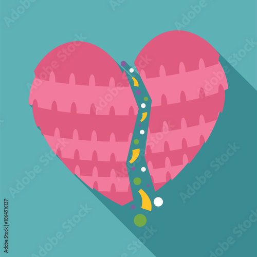 Pink heart shaped pinata breaking open, spilling colorful candy and confetti