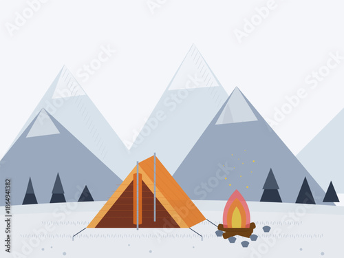 Camping in the mountains with a tent and campfire during winter