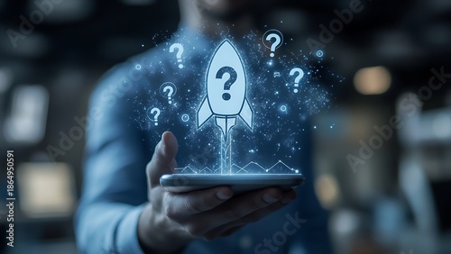 Hand holding a phone displays a rocket icon and question marks. The image suggests questions related to launching or uploading digital files.
