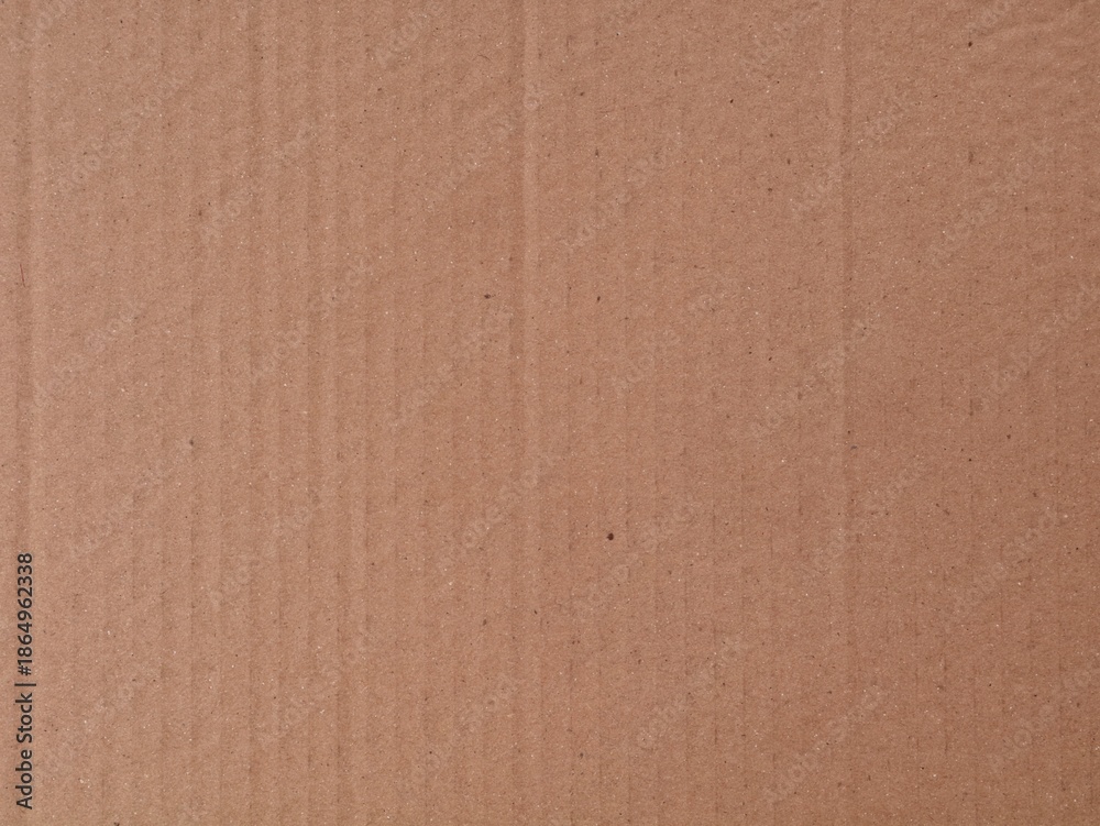 Fototapeta premium Brown corrugated cardboard texture background. perfect for eco-friendly packaging design, shipping concepts, or rustic background