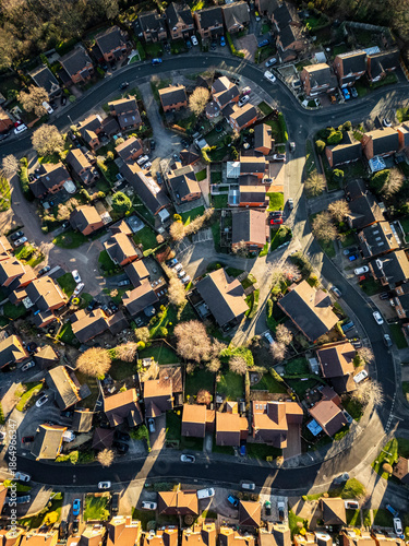 Bird’s-eye view of residential streets with detached and semi-detached houses in Morley, showing suburban housing patterns, rooftops, roads and neighbourhood layout in a northern English town.