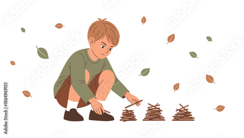 Pensive Little Boy Building Structures Out Of Twigs Surrounded With Autumn Leaves