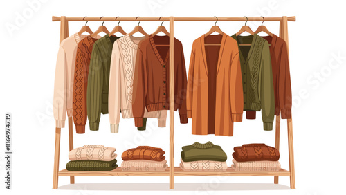 Wooden clothing rack displaying a neatly organized collection of folded and hanging knit sweaters and cardigans in warm autumn colors.