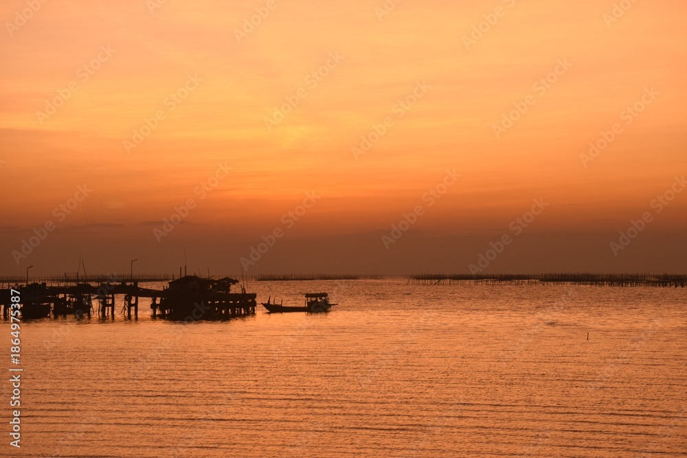 Fototapeta premium landscape of sea on sunset at Ang Sila beach travel location in Thailand