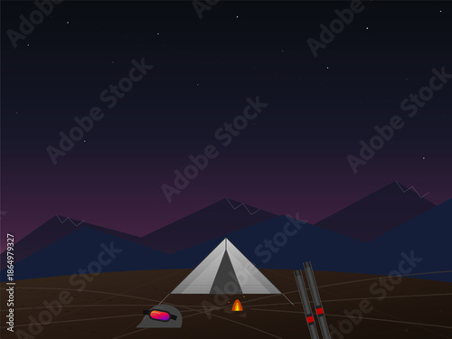 Camping under the stars with a tent and a campfire in a mountain landscape at night featuring a clear dark sky
