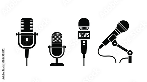 Four vintage microphones in a row a striking black silhouette