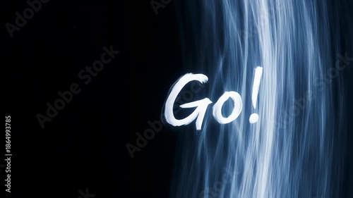 Go word written on a dark blue abstract background with motion blur effect.