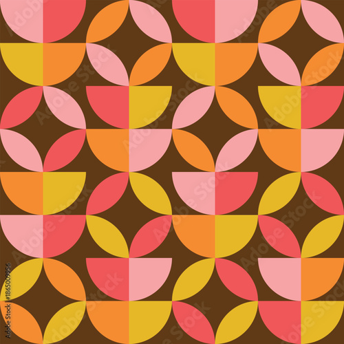 Mid century abstract semi circles and shapes in orange, yellow, pink and red seamless pattern on brown background. For wallpaper, retro backgrounds, home  decor and fabric 