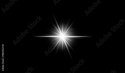 Bright Light Starburst with Soft Glows on a Black Background, Radiant and Dreamy Effect