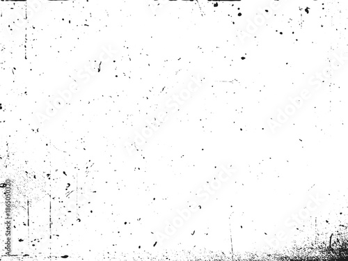 Abstract grunge overlay texture with distressed black specks and scratches on a white background, creating a worn effect.
