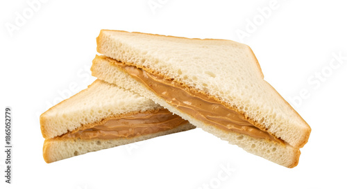 Two peanut butter sandwiches on white bread food snack