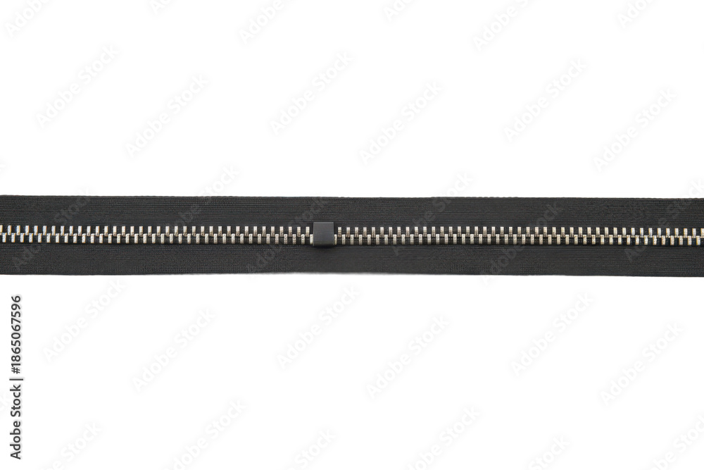 Fototapeta premium Close-up view of a metallic zipper with a dark fabric backing