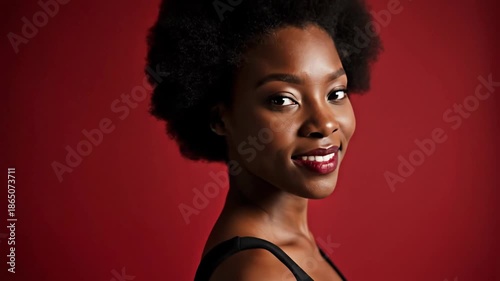 Woman portrait with red background elegant appearance studio shot