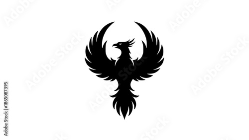 Majestic black silhouette graphic design of the mythical phoenix bird with wide spread wings symbolizing rebirth and immortal powerful victory