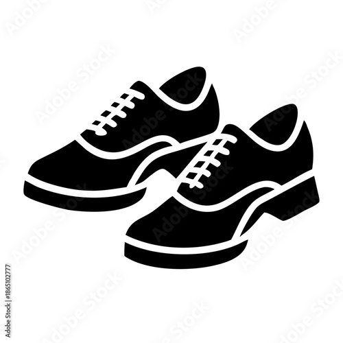 Elegant pair of formal lace-up shoes in a classic black glyph icon design for attire