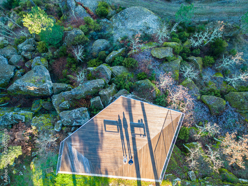 Shadows of people on the wooden viewpoint