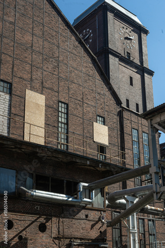 Industrial hall facade with clock tower