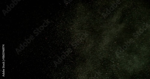 Super slow motion sandstorm and dust blizzard effect with airborne sand and fine particles, filmed at 500 fps on a high-speed camera. Isolated on black background, ideal as realistic VFX overlay.