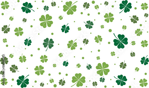 A festive background pattern featuring numerous green four-leaf clovers scattered across a white surface.