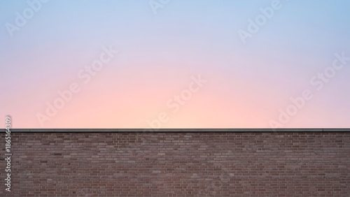 Blurry image of brick wall at sunset