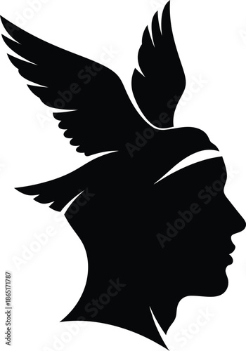 Silhouette of human head profile with bird wings freedom concept