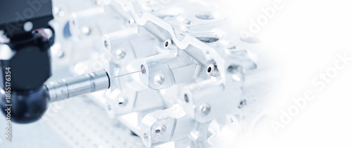 Cnc coordinate measuring machine inspecting metal component for precision engineering