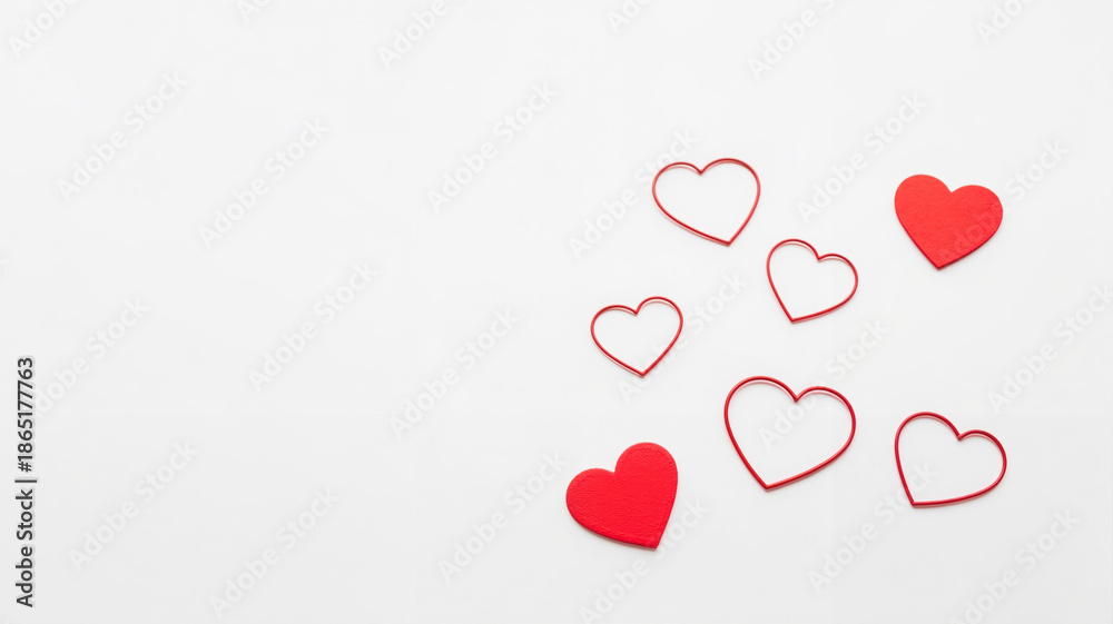 Fototapeta premium Red and pink paper hearts on white background for decoration 