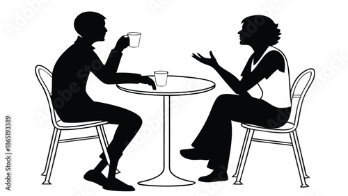 a couple enjoying a cafe moment seated at a small table with drinks in silhouette