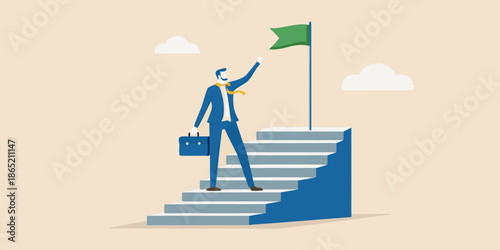 A businessman celebrates success reaching the top of a staircase with a flag