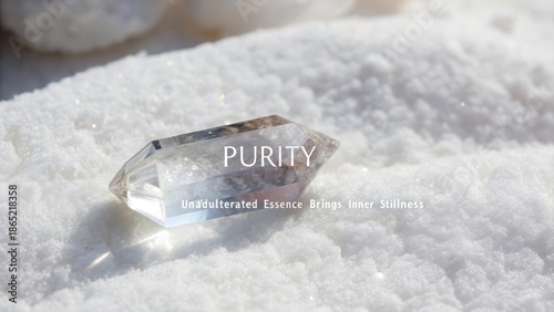 A single perfectly formed clear quartz crystal rests on a textured white surface with the word Purity displayed prominently