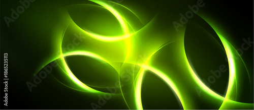 Abstract green light shapes overlap, creating dynamic energy flow. Dark background emphasizes glowing curves, lines.