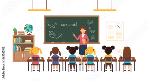 Female teacher pointing to a chalkboard with the word 'welcome' in front of a classroom of diverse young female students.
