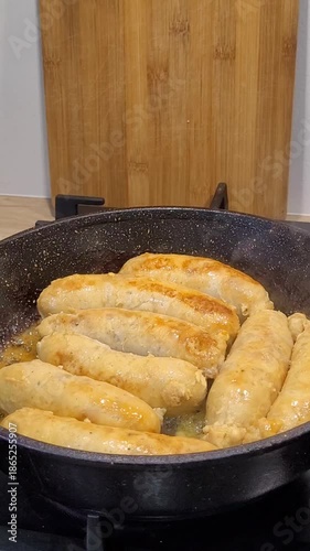 Cooking sausages at home. The process of turning homemade sausages