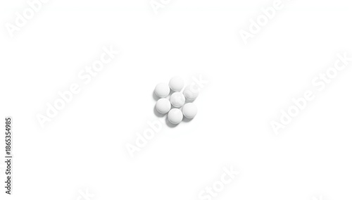 Array of white pill tablets...
