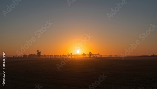 Sunrise in countryside with...