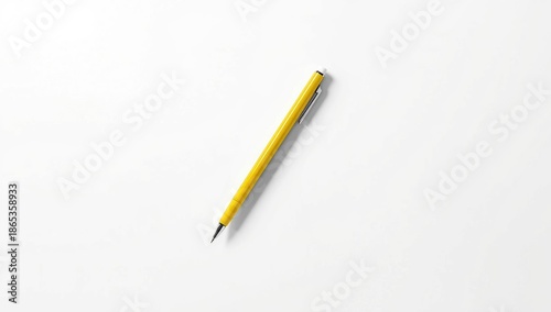 Yellow pen with a clean whi...