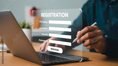 Online User Registration Concept: Person Filling Digital Form on Laptop for Secure Account Signup