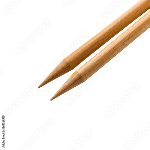 Wooden Chopsticks Resting on a Surface in Natural Light