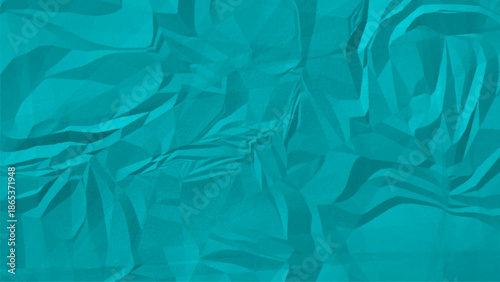 A close up view of a mint green textured surface with irregular patterns and wrinkled and crumpled paper texture.