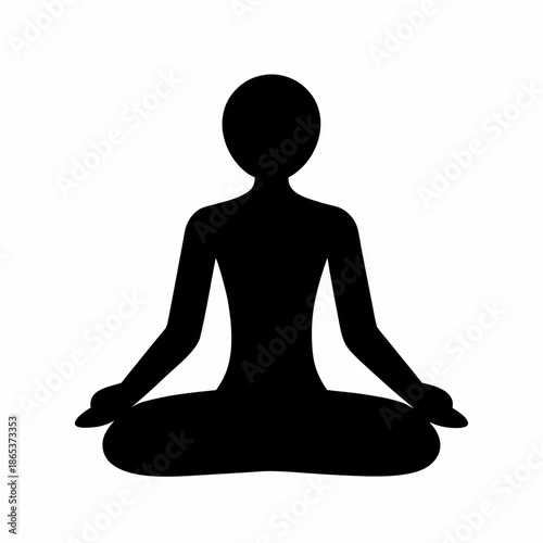 Silhouette of a person in a lotus position practicing yoga meditation